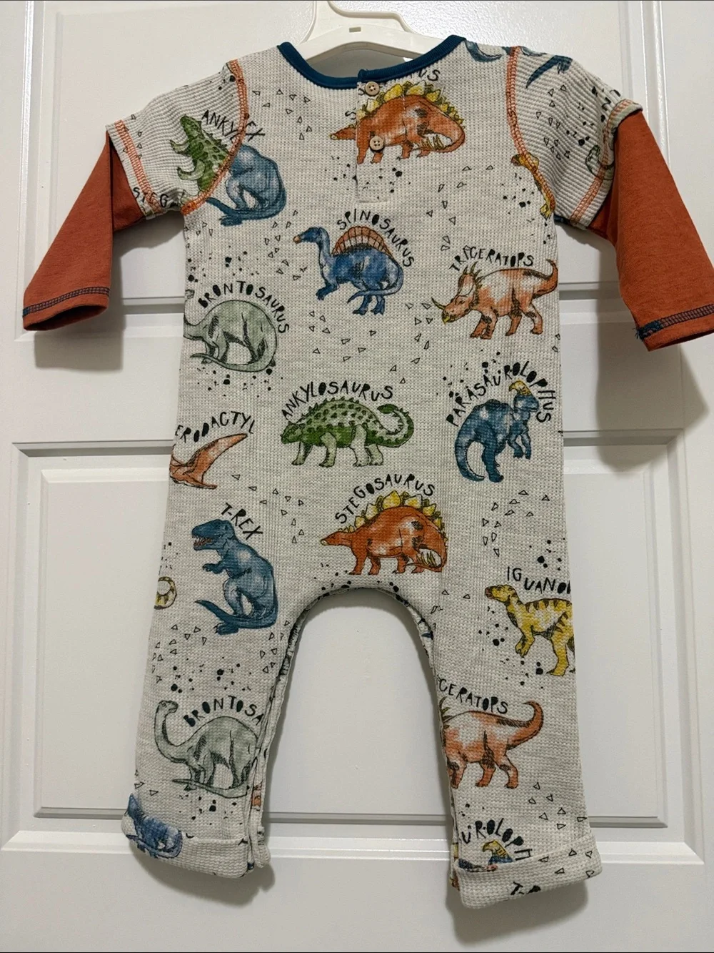 Mud Pie Kids Dinosaur Print One-Piece Bodysuit — Cream Body with Rust Sleeves